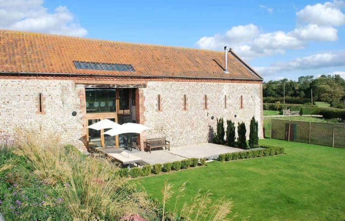 luxury hen party barn accommodation in a countryside son a sunny day on henbox