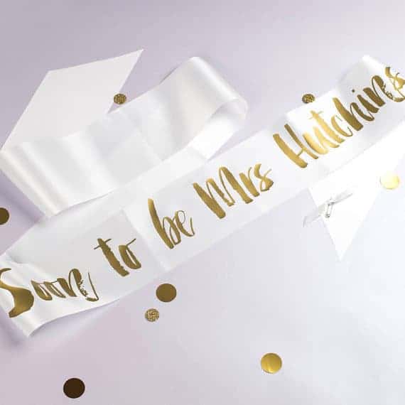 classy white and gold hen party sash